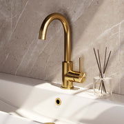 Basin tap, surface-mounted, curved spout - gold