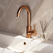 Basin tap, surface-mounted, curved spout - copper