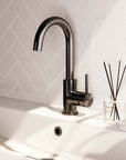 Waschtischarmatur, Aufputzmontage, gebogener Auslauf – Gunmetal
